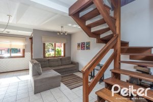 Casa em Condomínio à venda com 147m², 3 dormitórios, 1 suíte, 2 vagas, no bairro Cavalhada em Porto Alegre