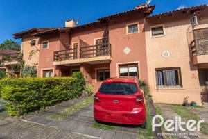 Casa em Condomínio à venda com 147m², 3 dormitórios, 1 suíte, 2 vagas, no bairro Cavalhada em Porto Alegre