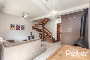 Casa em Condomínio à venda com 147m², 3 dormitórios, 1 suíte, 2 vagas, no bairro Cavalhada em Porto Alegre