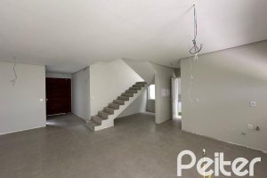 Casa em Condomínio à venda com 266m², 3 dormitórios, 3 suítes, 2 vagas, no bairro Hipica em PORTO ALEGRE