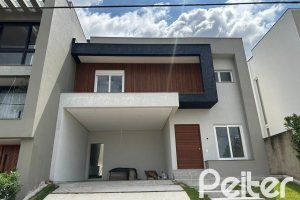 Casa em Condomínio à venda com 266m², 3 dormitórios, 3 suítes, 2 vagas, no bairro Hipica em PORTO ALEGRE