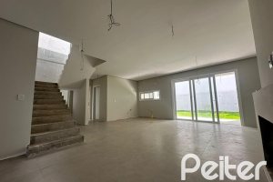 Casa em Condomínio à venda com 266m², 3 dormitórios, 3 suítes, 2 vagas, no bairro Hipica em PORTO ALEGRE