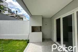 Casa em Condomínio à venda com 266m², 3 dormitórios, 3 suítes, 2 vagas, no bairro Hipica em PORTO ALEGRE