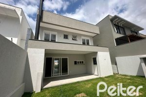 Casa em Condomínio à venda com 266m², 3 dormitórios, 3 suítes, 2 vagas, no bairro Hipica em PORTO ALEGRE