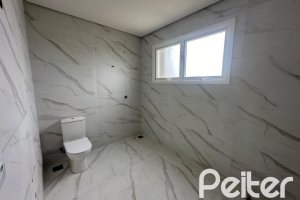 Casa em Condomínio à venda com 266m², 3 dormitórios, 3 suítes, 2 vagas, no bairro Hipica em PORTO ALEGRE