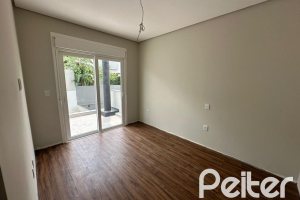 Casa em Condomínio à venda com 266m², 3 dormitórios, 3 suítes, 2 vagas, no bairro Hipica em PORTO ALEGRE