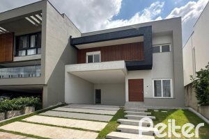 Casa em Condomínio à venda com 266m², 3 dormitórios, 3 suítes, 2 vagas, no bairro Hipica em PORTO ALEGRE