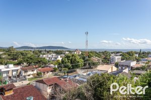 Casa à venda com 164m², 3 dormitórios, 1 suíte, 2 vagas, no bairro Ipanema em Porto Alegre