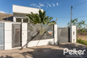 Casa à venda com 164m², 3 dormitórios, 1 suíte, 2 vagas, no bairro Ipanema em Porto Alegre