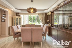 Casa à venda com 392m², 3 dormitórios, 1 suíte, 4 vagas, no bairro Tristeza em Porto Alegre