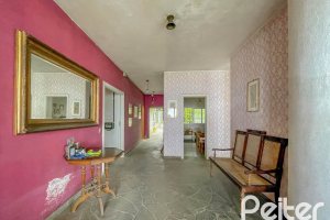 Casa à venda com 561m², 5 dormitórios, 4 vagas, no bairro Vila Assunção em Porto Alegre