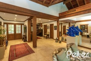 Casa em Condomínio à venda com 290m², 3 dormitórios, 3 suítes, 4 vagas, no bairro Terra Ville em PORTO ALEGRE