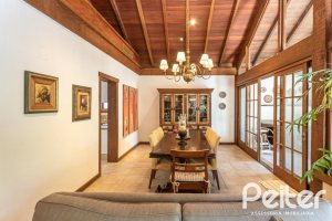 Casa em Condomínio à venda com 290m², 3 dormitórios, 3 suítes, 4 vagas, no bairro Terra Ville em PORTO ALEGRE