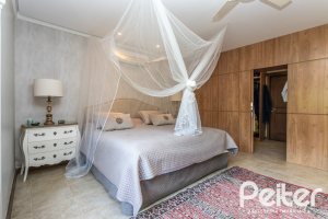 Casa em Condomínio à venda com 290m², 3 dormitórios, 3 suítes, 4 vagas, no bairro Terra Ville em PORTO ALEGRE