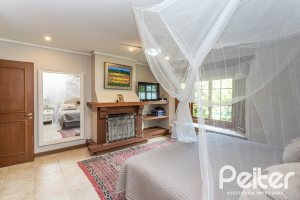 Casa em Condomínio à venda com 290m², 3 dormitórios, 3 suítes, 4 vagas, no bairro Terra Ville em PORTO ALEGRE