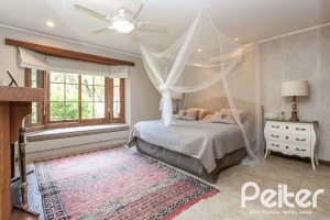 Casa em Condomínio à venda com 290m², 3 dormitórios, 3 suítes, 4 vagas, no bairro Terra Ville em PORTO ALEGRE