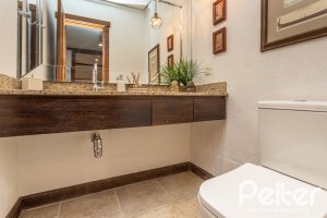 Casa em Condomínio à venda com 290m², 3 dormitórios, 3 suítes, 4 vagas, no bairro Terra Ville em PORTO ALEGRE