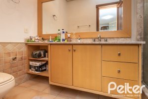 Casa em Condomínio à venda com 290m², 3 dormitórios, 3 suítes, 4 vagas, no bairro Terra Ville em PORTO ALEGRE