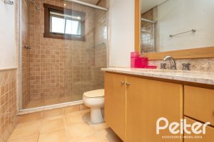 Casa em Condomínio à venda com 290m², 3 dormitórios, 3 suítes, 4 vagas, no bairro Terra Ville em PORTO ALEGRE