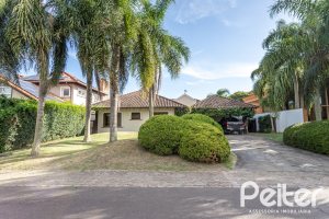 Casa em Condomínio à venda com 290m², 3 dormitórios, 3 suítes, 4 vagas, no bairro Terra Ville em PORTO ALEGRE