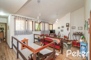 Casa à venda com 305m², 4 dormitórios, 2 suítes, 2 vagas, no bairro Sétimo Céu em Porto Alegre