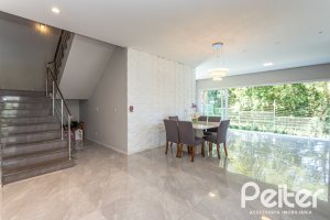 Casa em Condomínio à venda com 248m², 3 dormitórios, 2 suítes, 2 vagas, no bairro Alphaville em PORTO ALEGRE