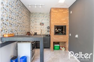 Casa em Condomínio à venda com 248m², 3 dormitórios, 2 suítes, 2 vagas, no bairro Alphaville em PORTO ALEGRE