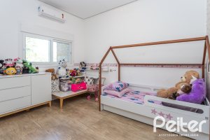 Casa em Condomínio à venda com 248m², 3 dormitórios, 2 suítes, 2 vagas, no bairro Alphaville em PORTO ALEGRE