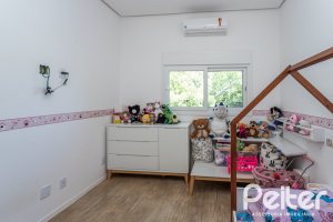 Casa em Condomínio à venda com 248m², 3 dormitórios, 2 suítes, 2 vagas, no bairro Alphaville em PORTO ALEGRE