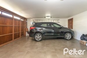 Casa à venda com 329m², 5 dormitórios, 3 suítes, 4 vagas, no bairro Vila Assunção em Porto Alegre