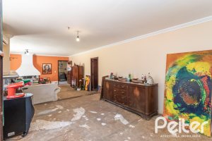 Casa à venda com 215m², 3 dormitórios, 1 suíte, 4 vagas, no bairro Tristeza em Porto Alegre