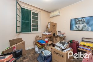 Casa à venda com 215m², 3 dormitórios, 1 suíte, 4 vagas, no bairro Tristeza em Porto Alegre