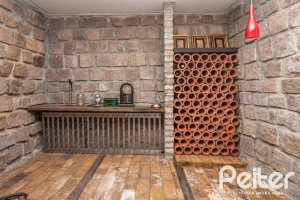 Casa à venda com 547m², 4 dormitórios, 4 suítes, 4 vagas, no bairro Vila Assunção em Porto Alegre