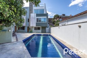 Casa à venda com 547m², 4 dormitórios, 4 suítes, 4 vagas, no bairro Vila Assunção em Porto Alegre