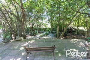 Casa à venda com 547m², 4 dormitórios, 4 suítes, 4 vagas, no bairro Vila Assunção em Porto Alegre