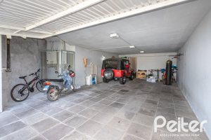 Casa à venda com 547m², 4 dormitórios, 4 suítes, 4 vagas, no bairro Vila Assunção em Porto Alegre