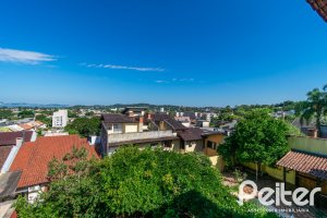 Casa à venda com 291m², 3 dormitórios, 1 suíte, 2 vagas, no bairro Ipanema em Porto Alegre