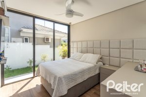 Casa em Condomínio à venda com 263m², 4 dormitórios, 4 suítes, 2 vagas, no bairro Alphaville em PORTO ALEGRE