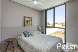 Casa em Condomínio à venda com 263m², 4 dormitórios, 4 suítes, 2 vagas, no bairro Alphaville em PORTO ALEGRE