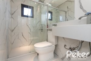 Casa em Condomínio à venda com 263m², 4 dormitórios, 4 suítes, 2 vagas, no bairro Alphaville em PORTO ALEGRE