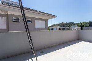 Casa em Condomínio à venda com 263m², 4 dormitórios, 4 suítes, 2 vagas, no bairro Alphaville em PORTO ALEGRE