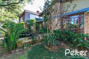 Casa à venda com 527m², 3 dormitórios, 1 suíte, 4 vagas, no bairro Jardim Isabel em Porto Alegre