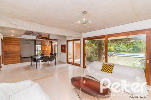 Casa em Condomínio à venda com 435m², 4 dormitórios, 3 suítes, 4 vagas, no bairro Terra Ville em PORTO ALEGRE