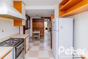 Casa em Condomínio à venda com 435m², 4 dormitórios, 3 suítes, 4 vagas, no bairro Terra Ville em PORTO ALEGRE