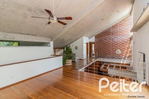 Casa em Condomínio à venda com 435m², 4 dormitórios, 3 suítes, 4 vagas, no bairro Terra Ville em PORTO ALEGRE