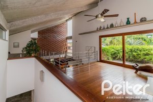 Casa em Condomínio à venda com 435m², 4 dormitórios, 3 suítes, 4 vagas, no bairro Terra Ville em PORTO ALEGRE