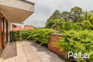 Casa em Condomínio à venda com 435m², 4 dormitórios, 3 suítes, 4 vagas, no bairro Terra Ville em PORTO ALEGRE
