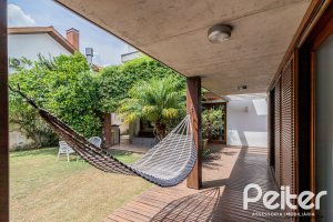 Casa em Condomínio à venda com 435m², 4 dormitórios, 3 suítes, 4 vagas, no bairro Terra Ville em PORTO ALEGRE