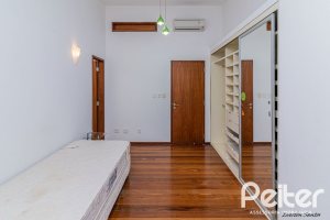 Casa em Condomínio à venda com 435m², 4 dormitórios, 3 suítes, 4 vagas, no bairro Terra Ville em PORTO ALEGRE