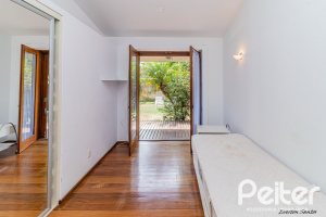 Casa em Condomínio à venda com 435m², 4 dormitórios, 3 suítes, 4 vagas, no bairro Terra Ville em PORTO ALEGRE